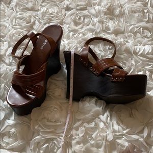 BEBE brown leather heels.